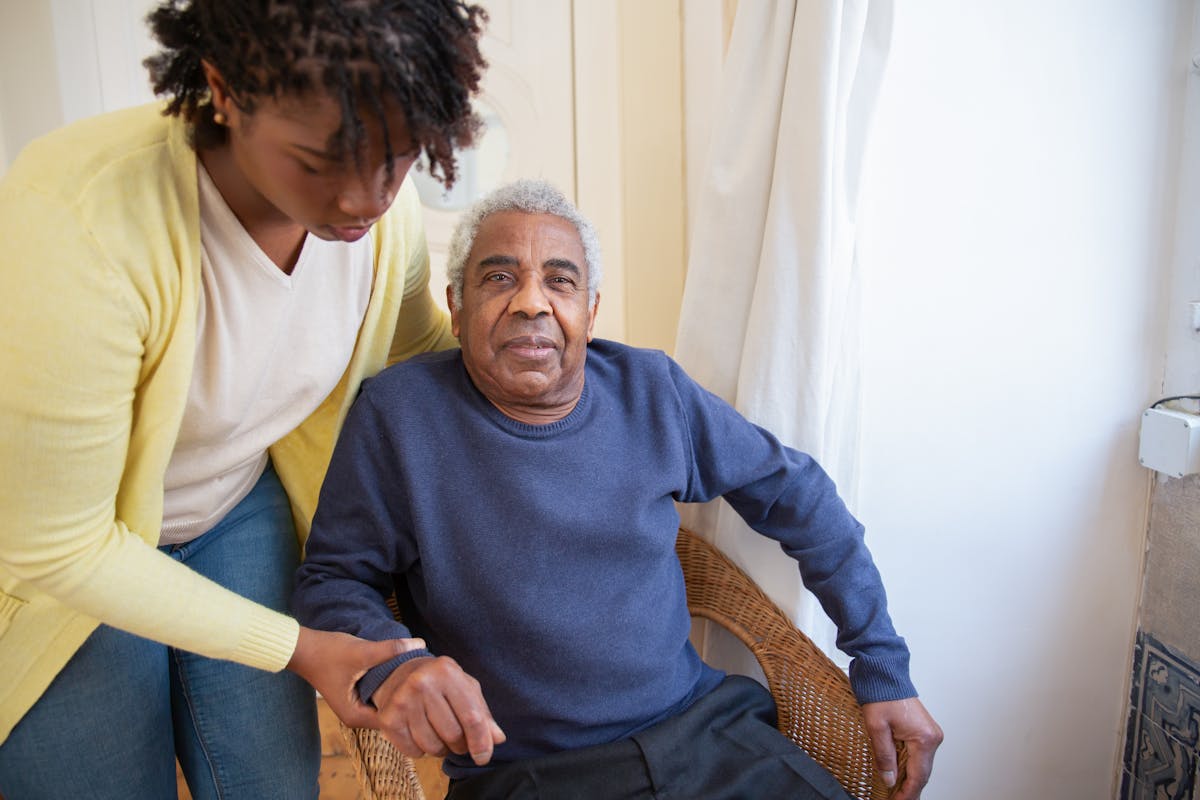 Older adult taking part in a group mobility session